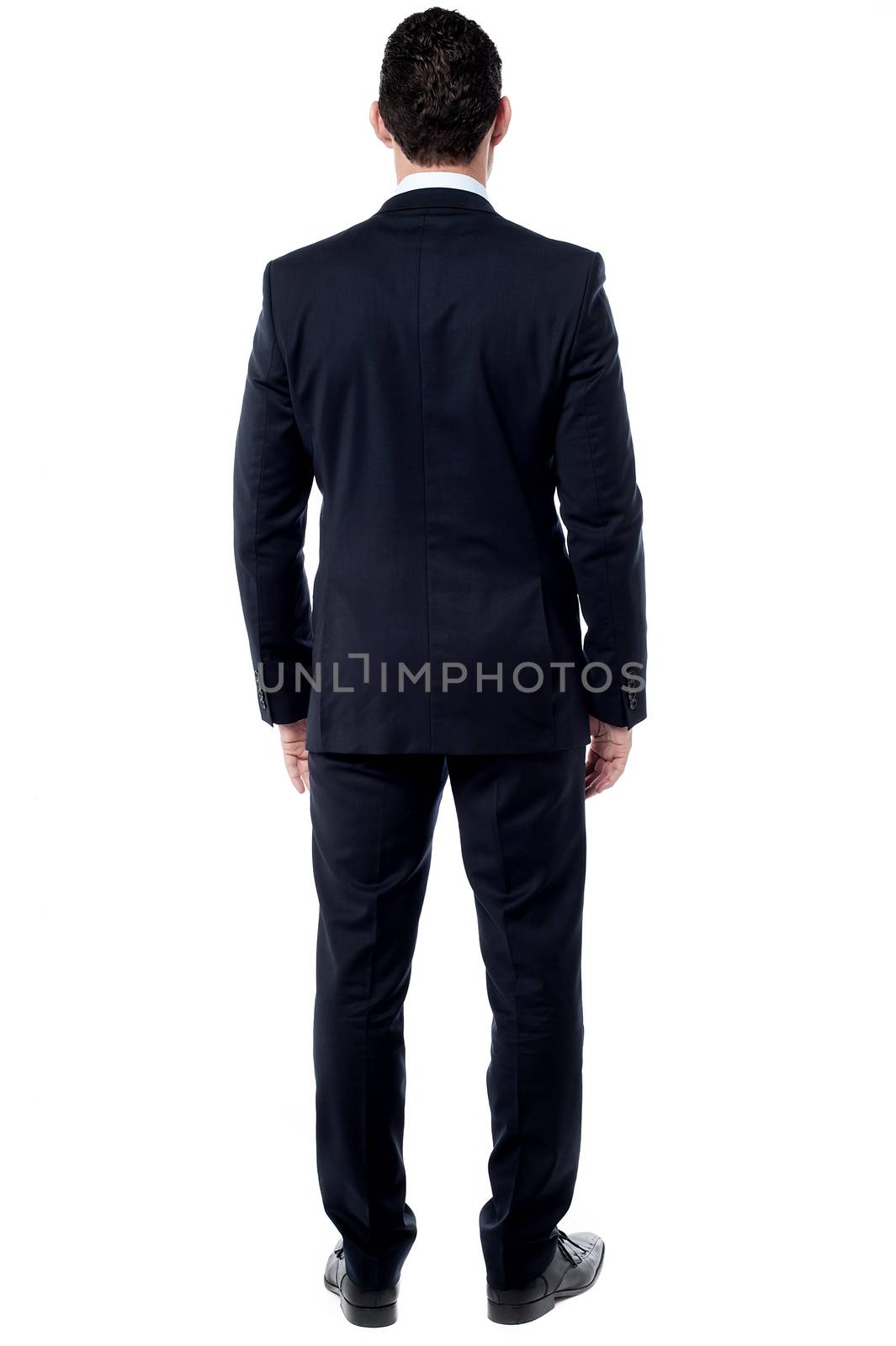 Back pose of male entrepreneur by stockyimages