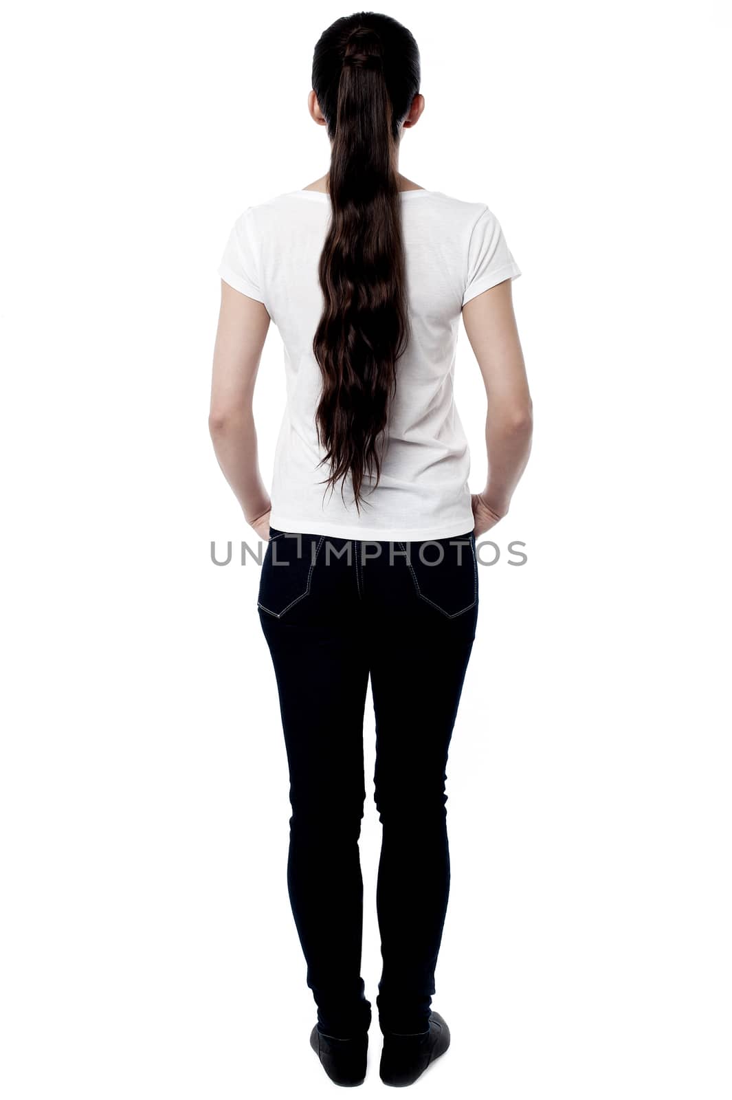 Full length image of young woman from back