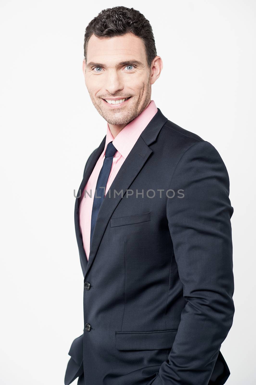Sideways of male entrepreneur with his hands in pocket