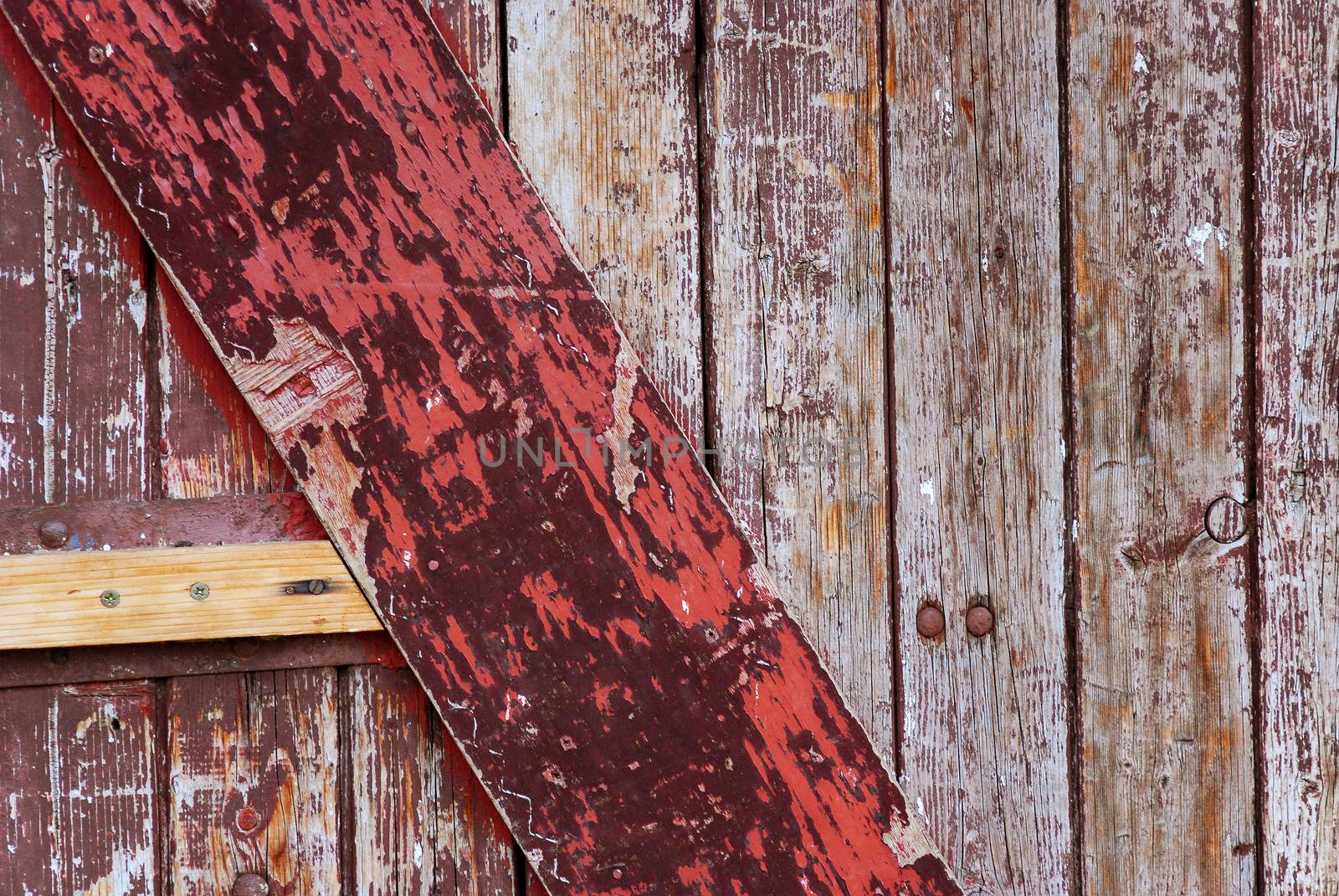 Picture of an  Old    wooden door with peeled paint