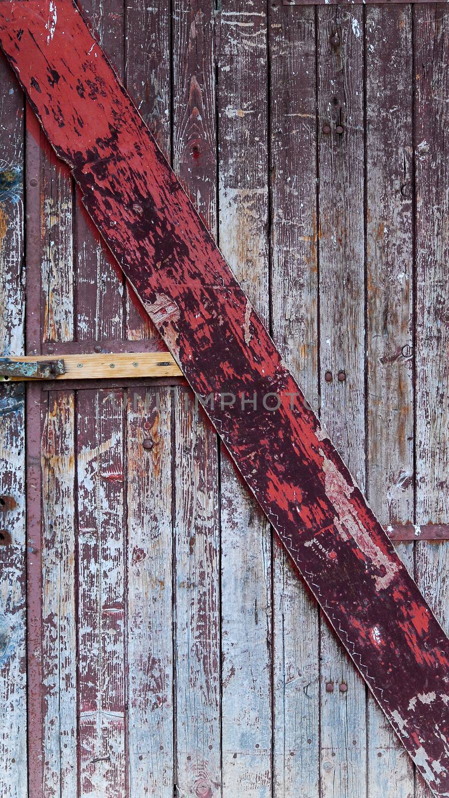 Picture of an  Old    wooden door with peeled paint