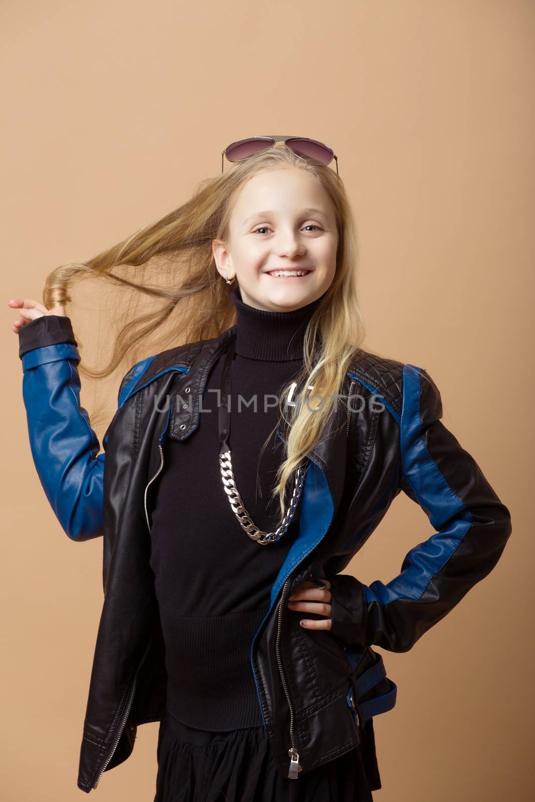 Fashion smiley european little girl posing by artush