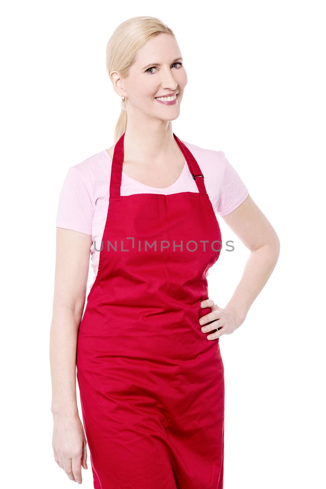 Casual pose of female chef  by stockyimages