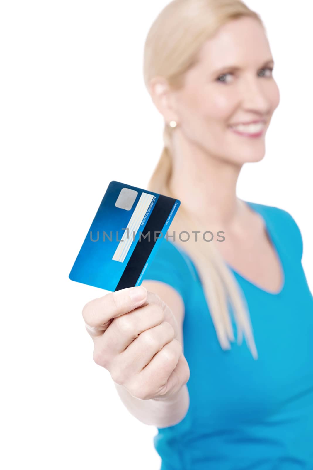 Woman showing credit card, focus on card