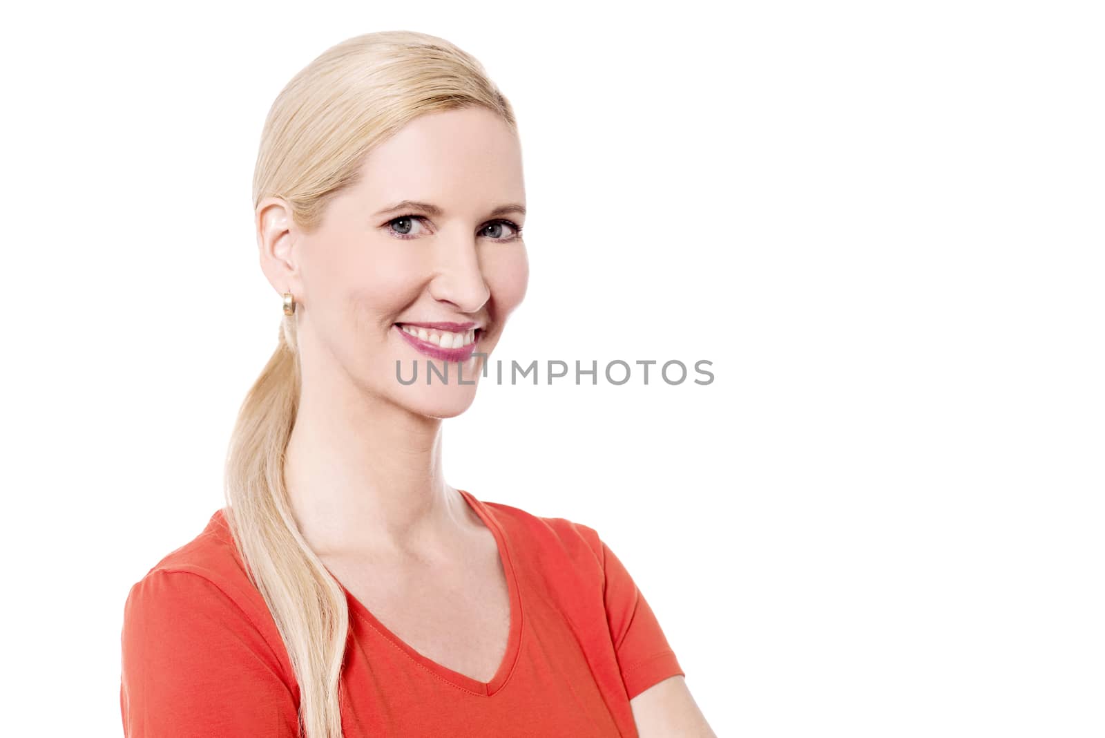 Beautiful smiling woman posing to camera