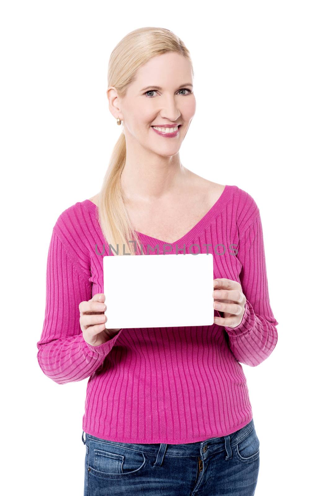 Smiling woman showing blank white ad board.