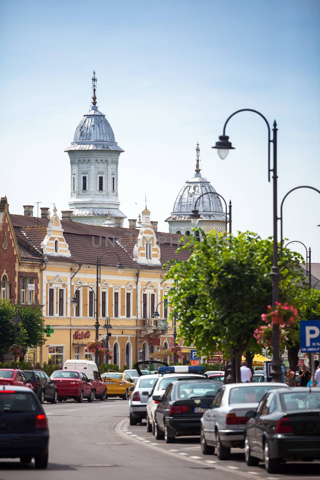 Turda, Romania - June 23, 2013:  Turda old city center view with ortodox church towers on background, Romania