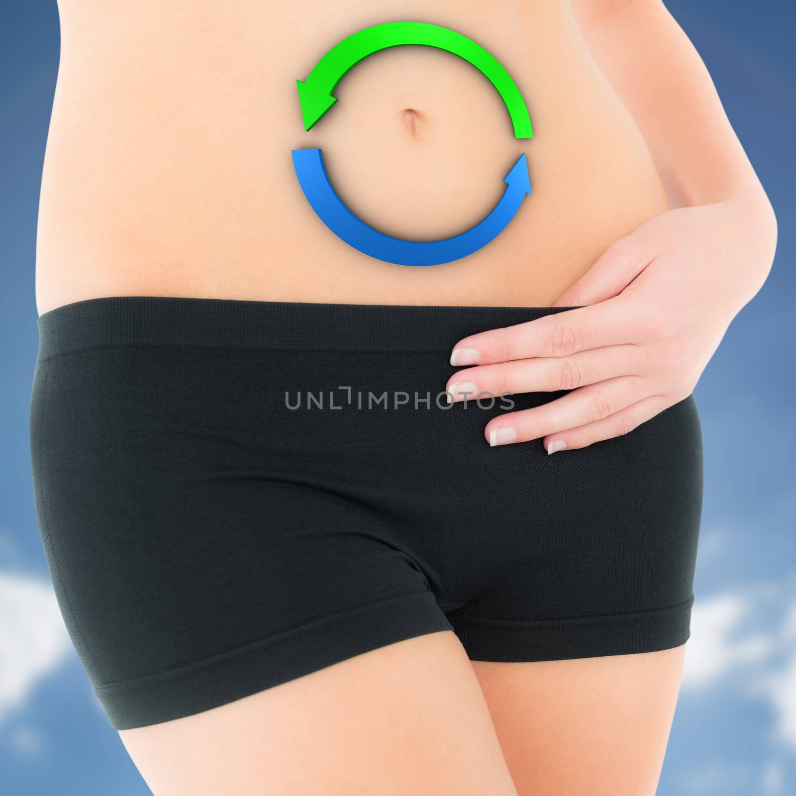 Composite image of closeup mid section of a fit woman in black shorts by Wavebreakmedia