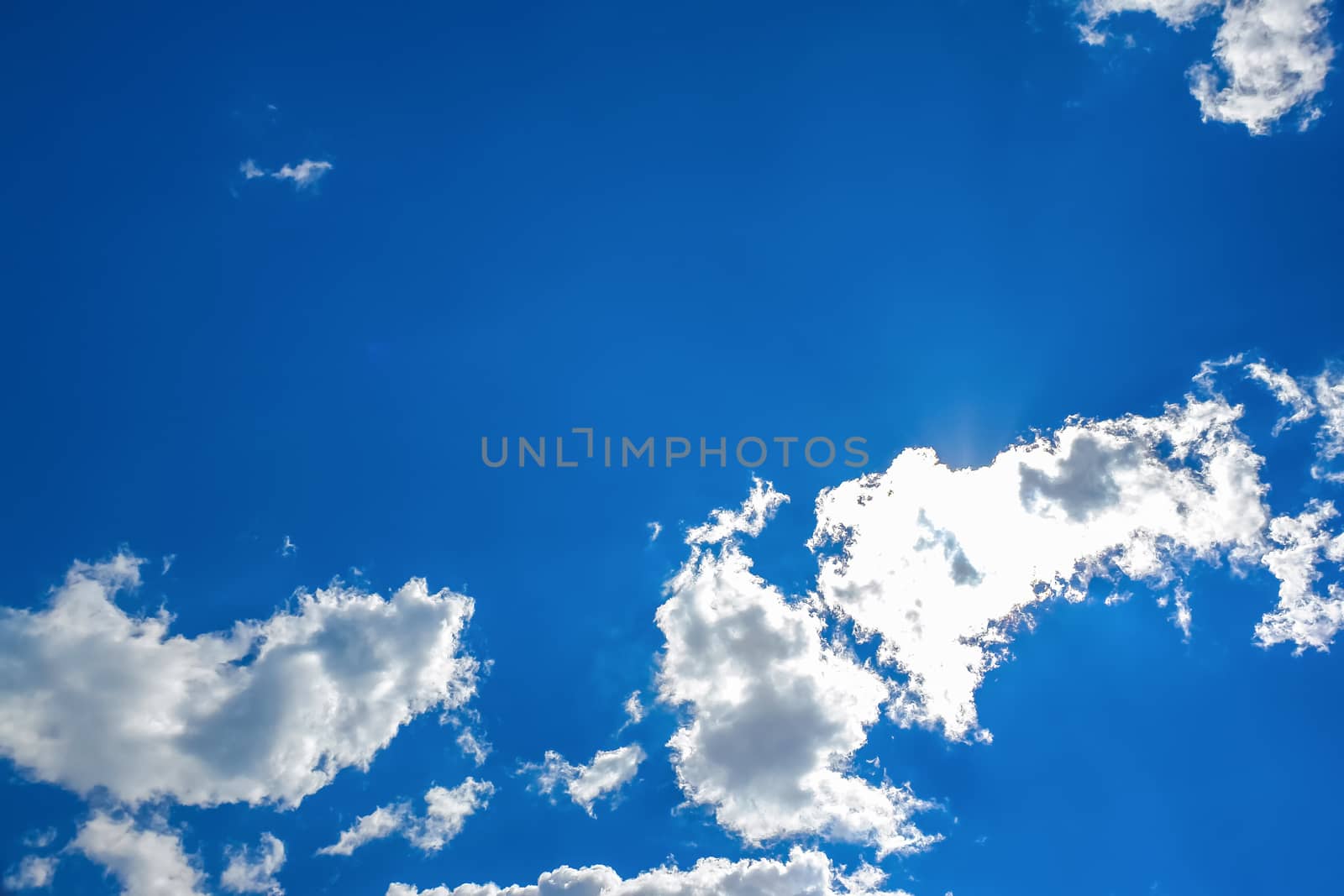 White clouds on blue sky background