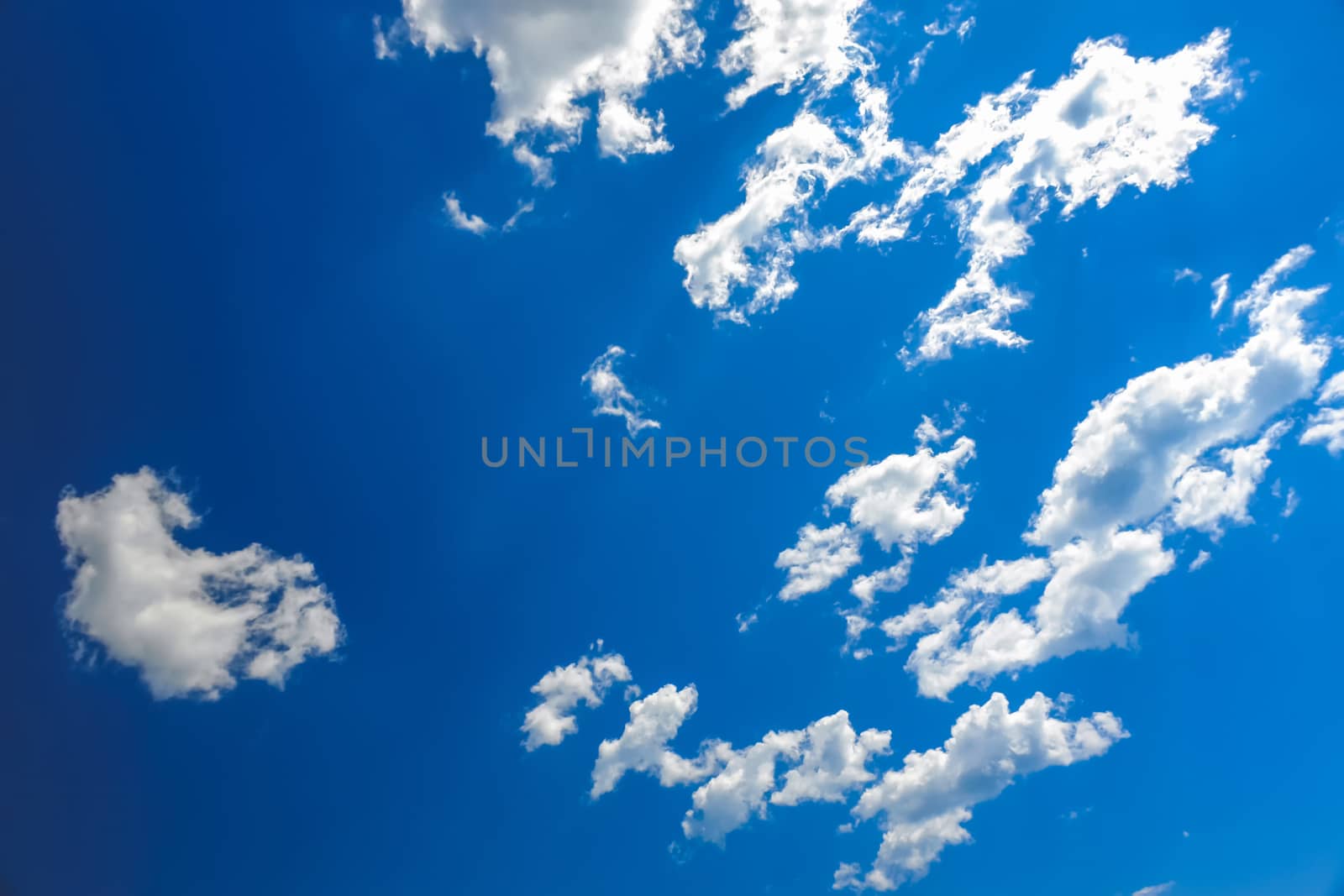 White clouds on blue sky background