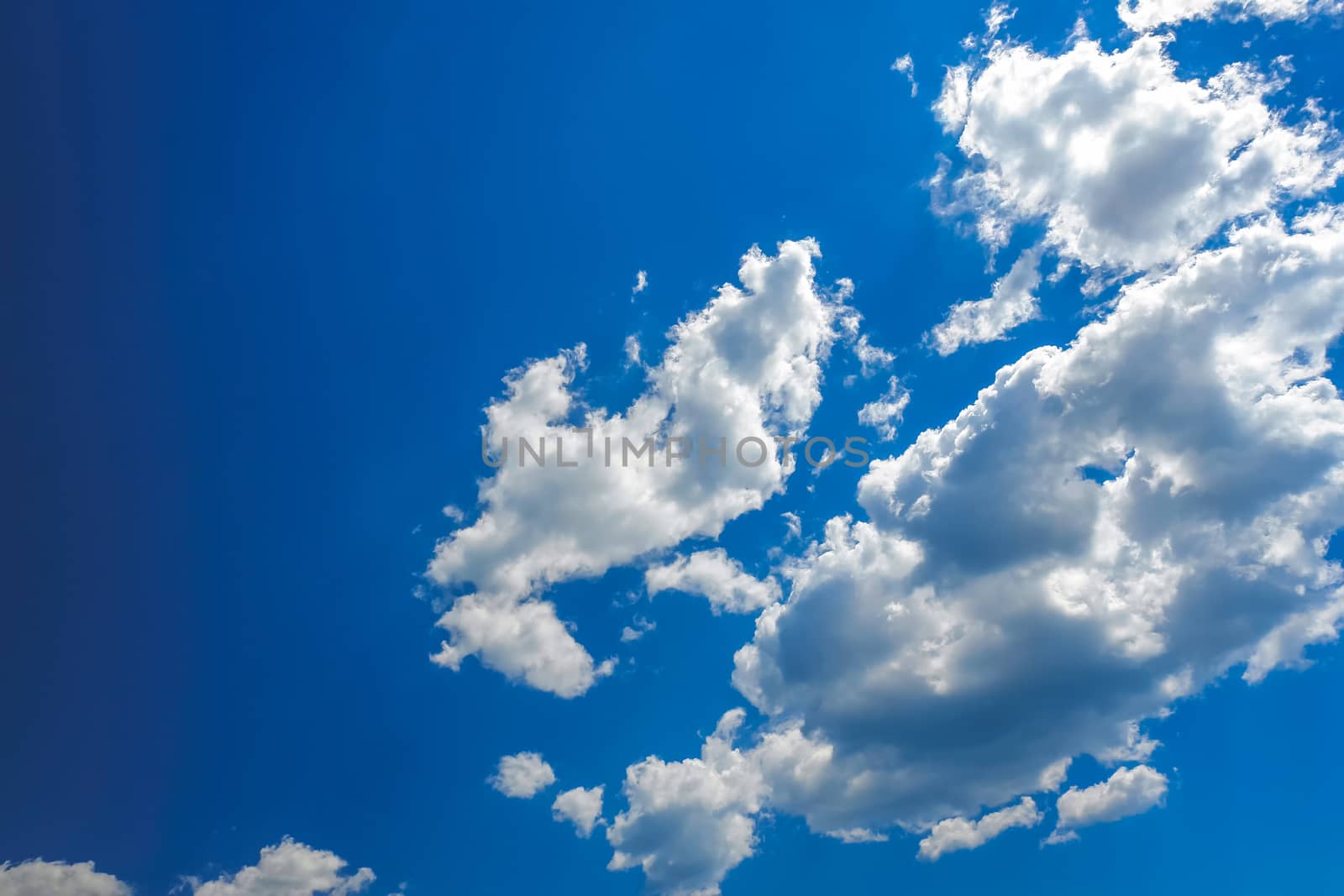 White clouds on blue sky background