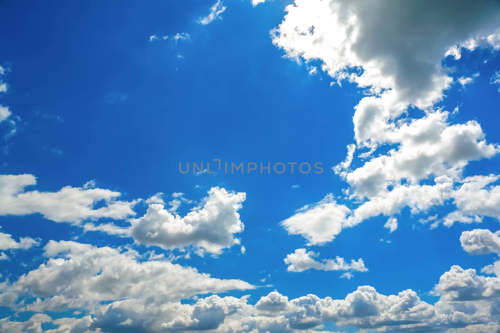 White clouds on blue sky background