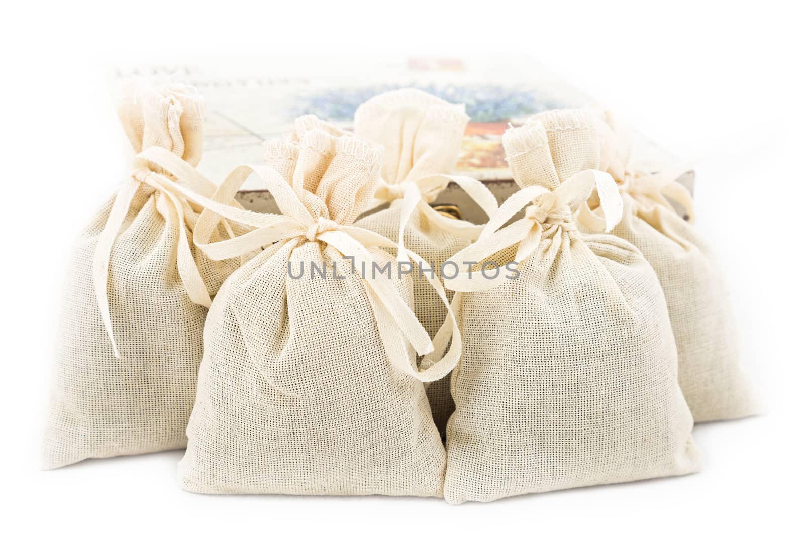Textile sachet pouches on white background
