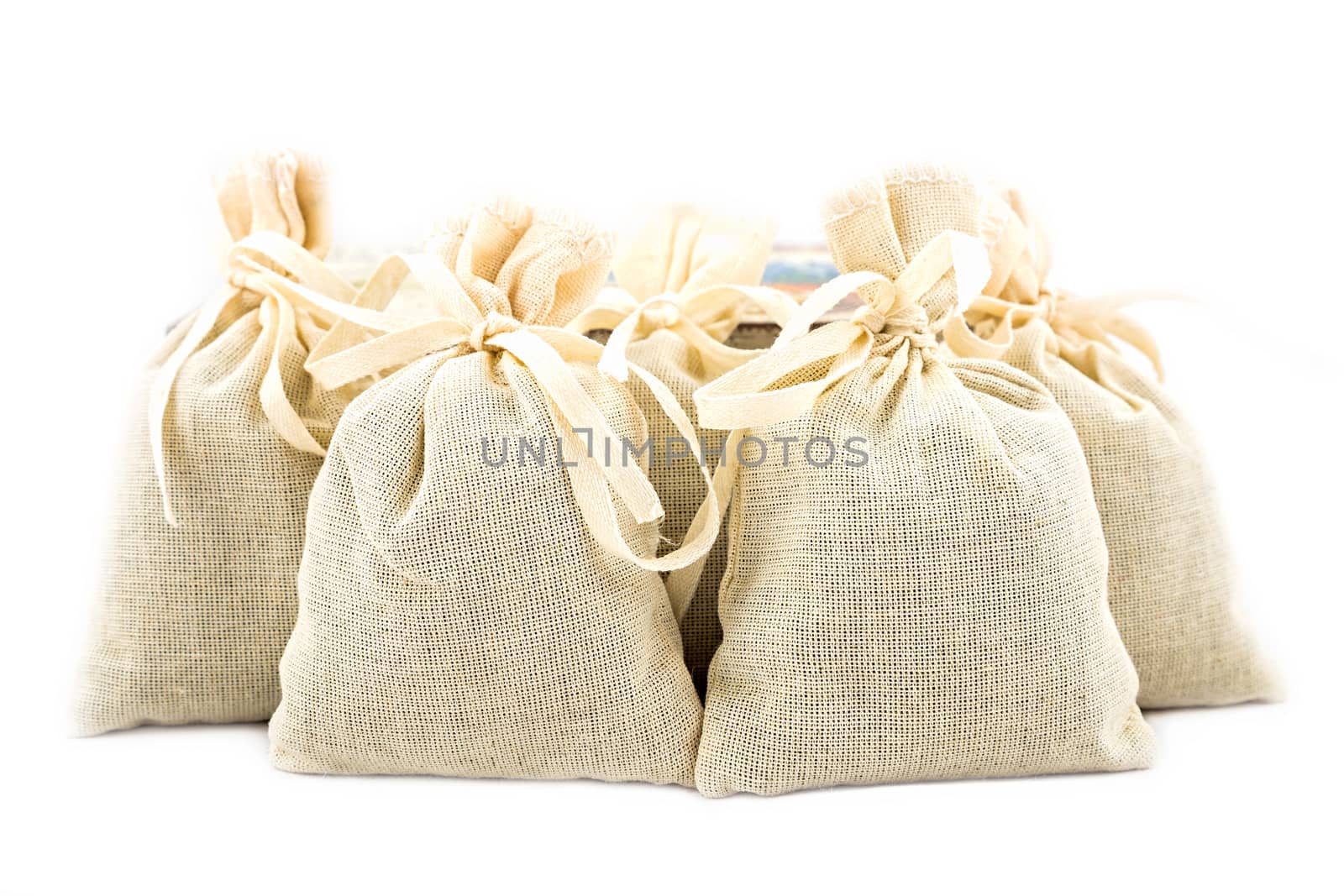 Textile sachet pouches on white background