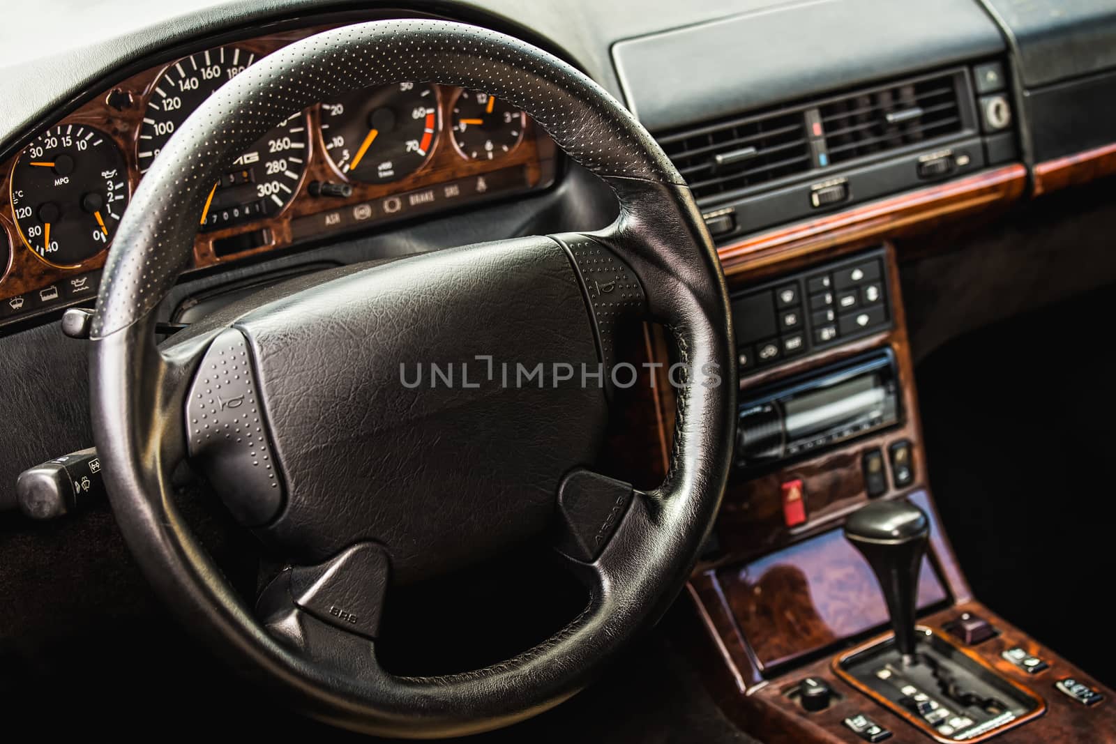 Steering wheel and dashboard in interior of the sports car