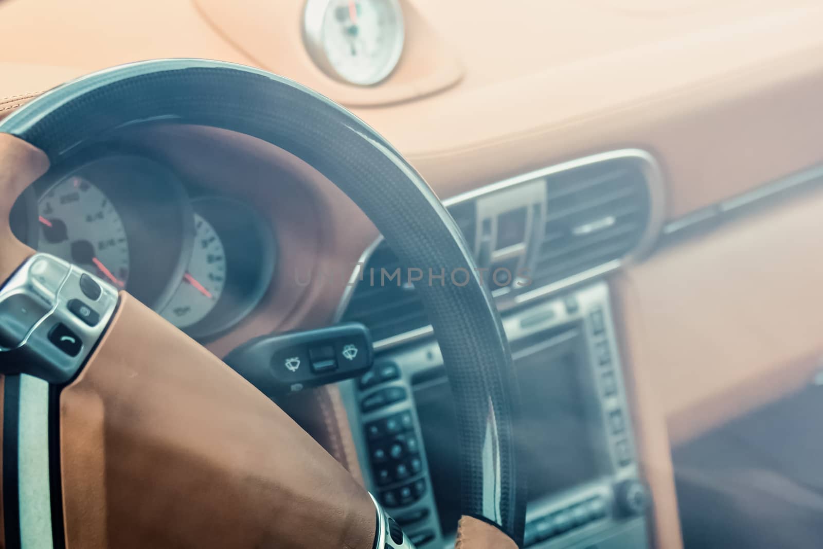 Steering wheel in interior of the sports car