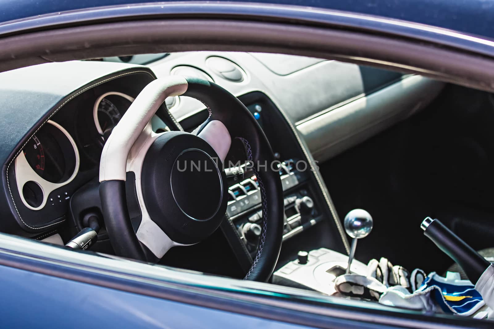 Steering wheel in interior of the sports car