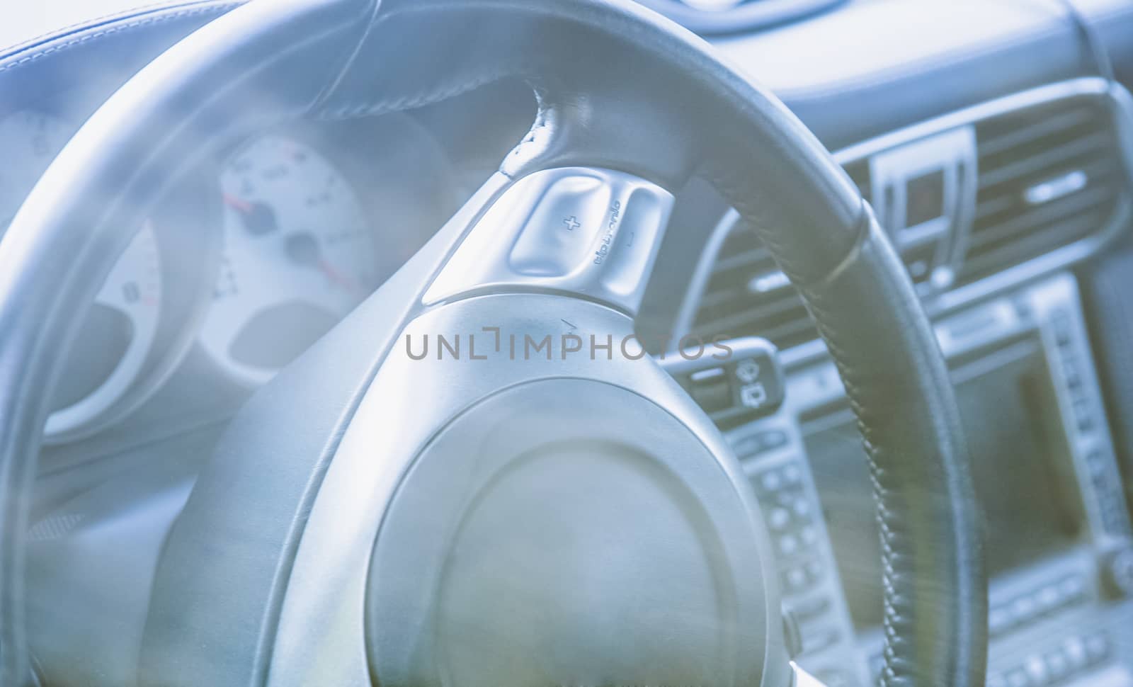 Steering wheel in interior of the sports car