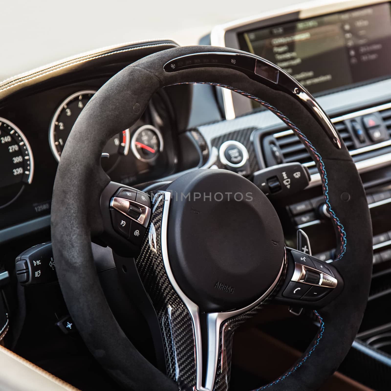 Steering wheel in interior of the sports car
