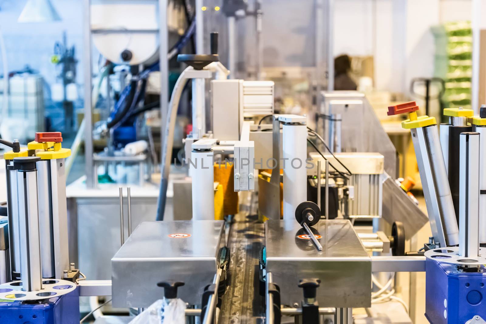 Automatic packing line of conveyor. Pharmaceutical and chemical industry. Manufacture on factory