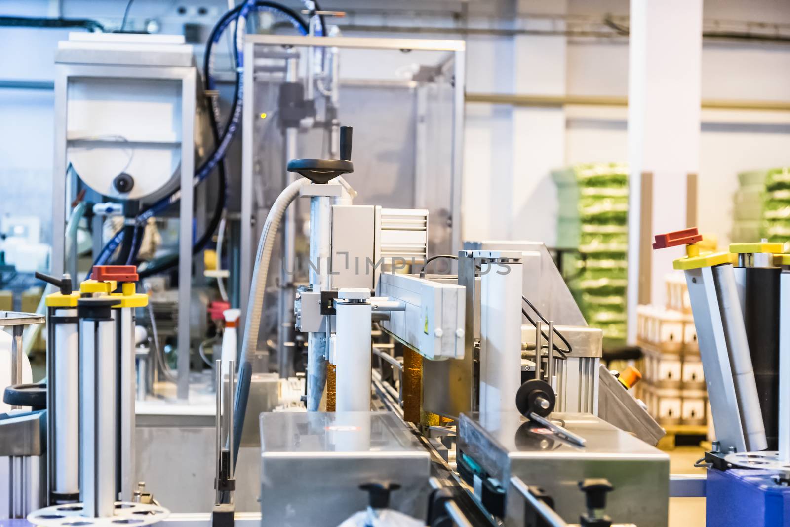 Automatic packing line of conveyor. Pharmaceutical and chemical industry. Manufacture on factory
