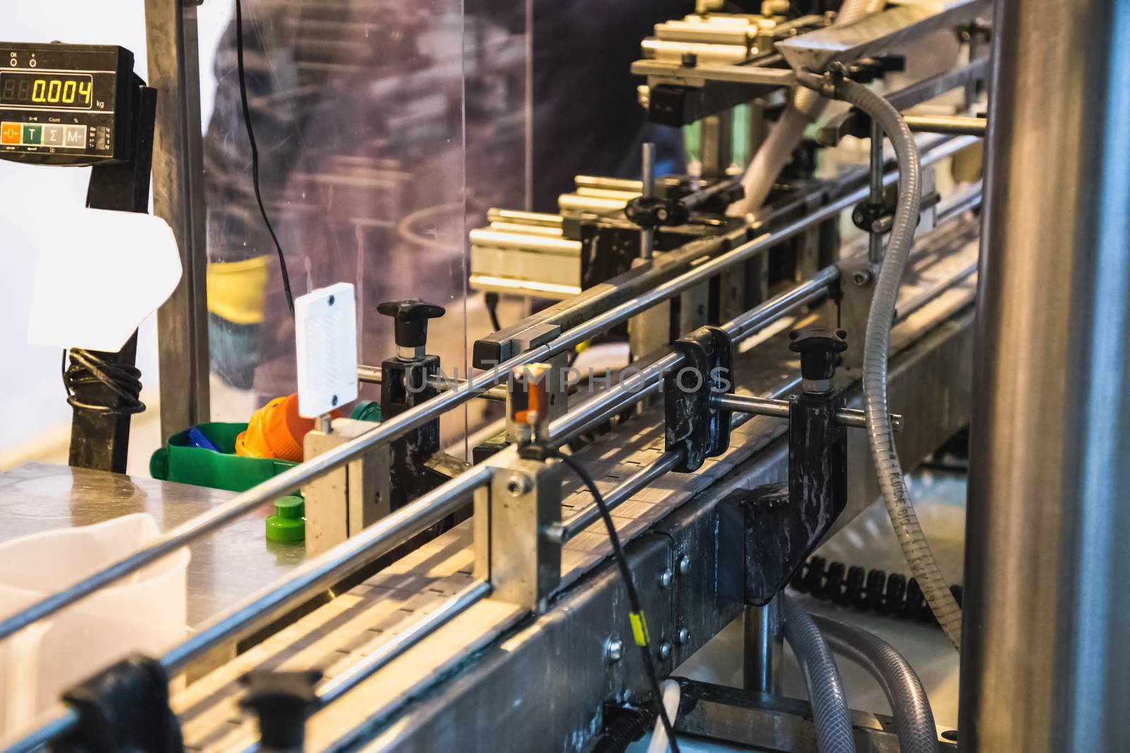 Automatic packing line of conveyor. Pharmaceutical and chemical industry. Manufacture on factory