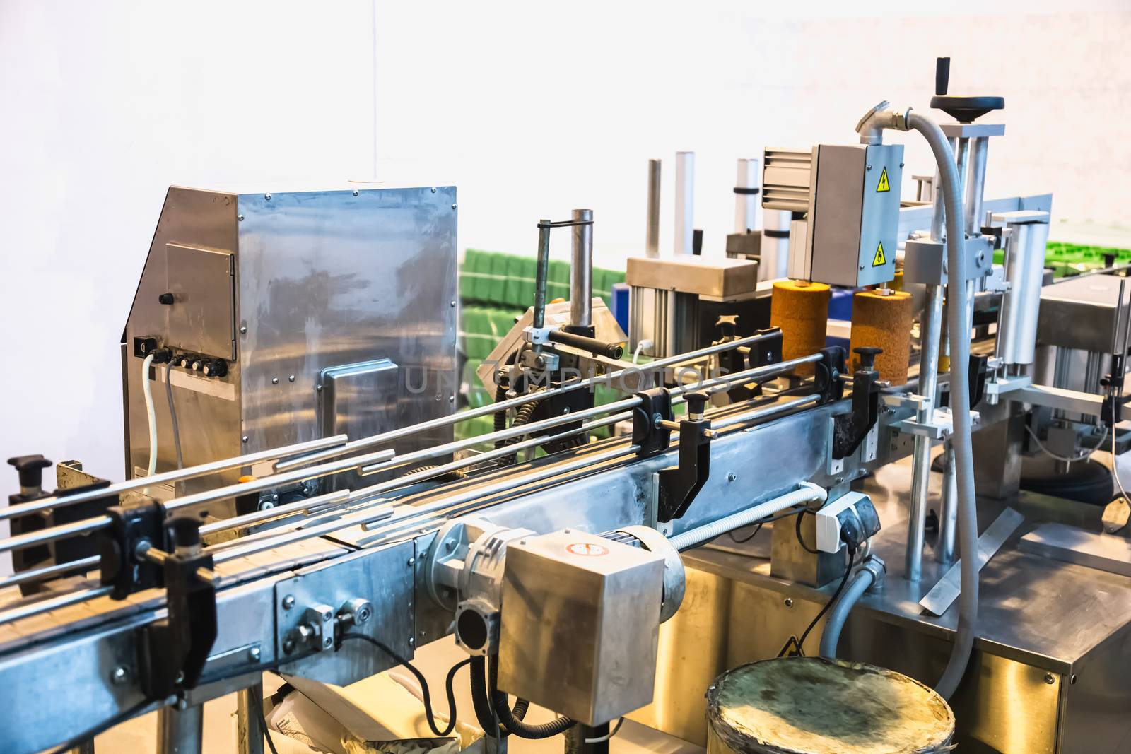 Automatic packing line of conveyor. Pharmaceutical and chemical industry. Manufacture on factory