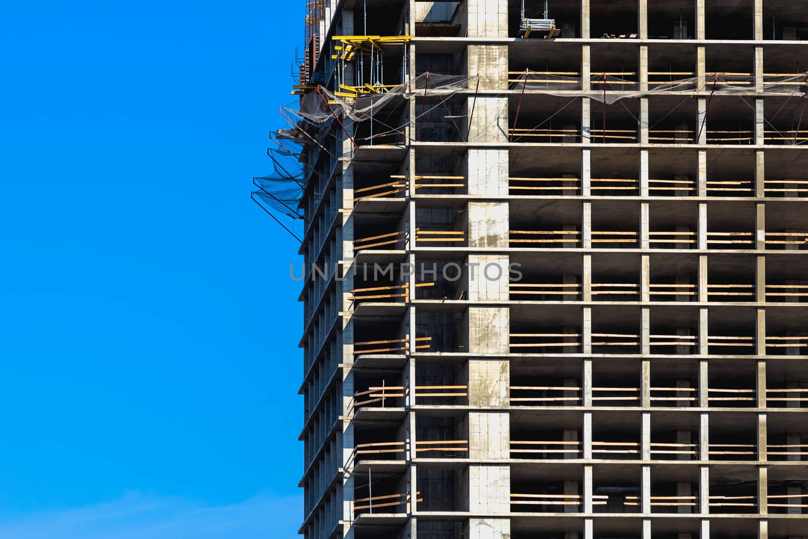 Building construction on blue sky background