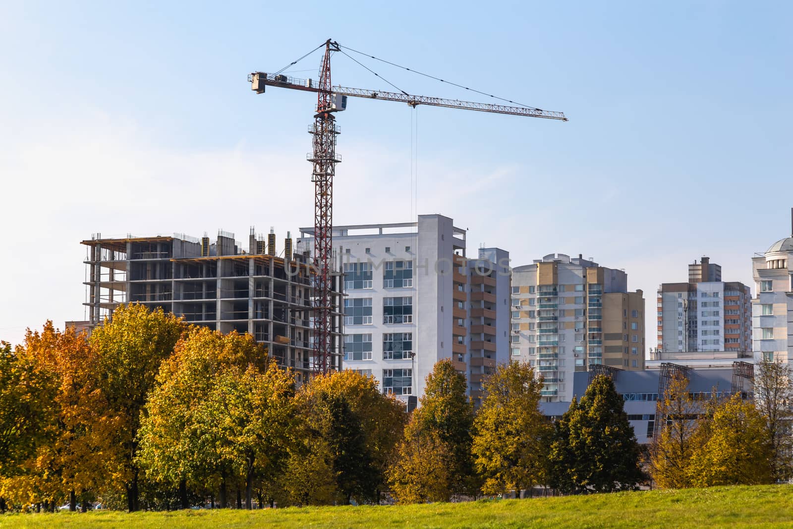 Building crane on construction of city