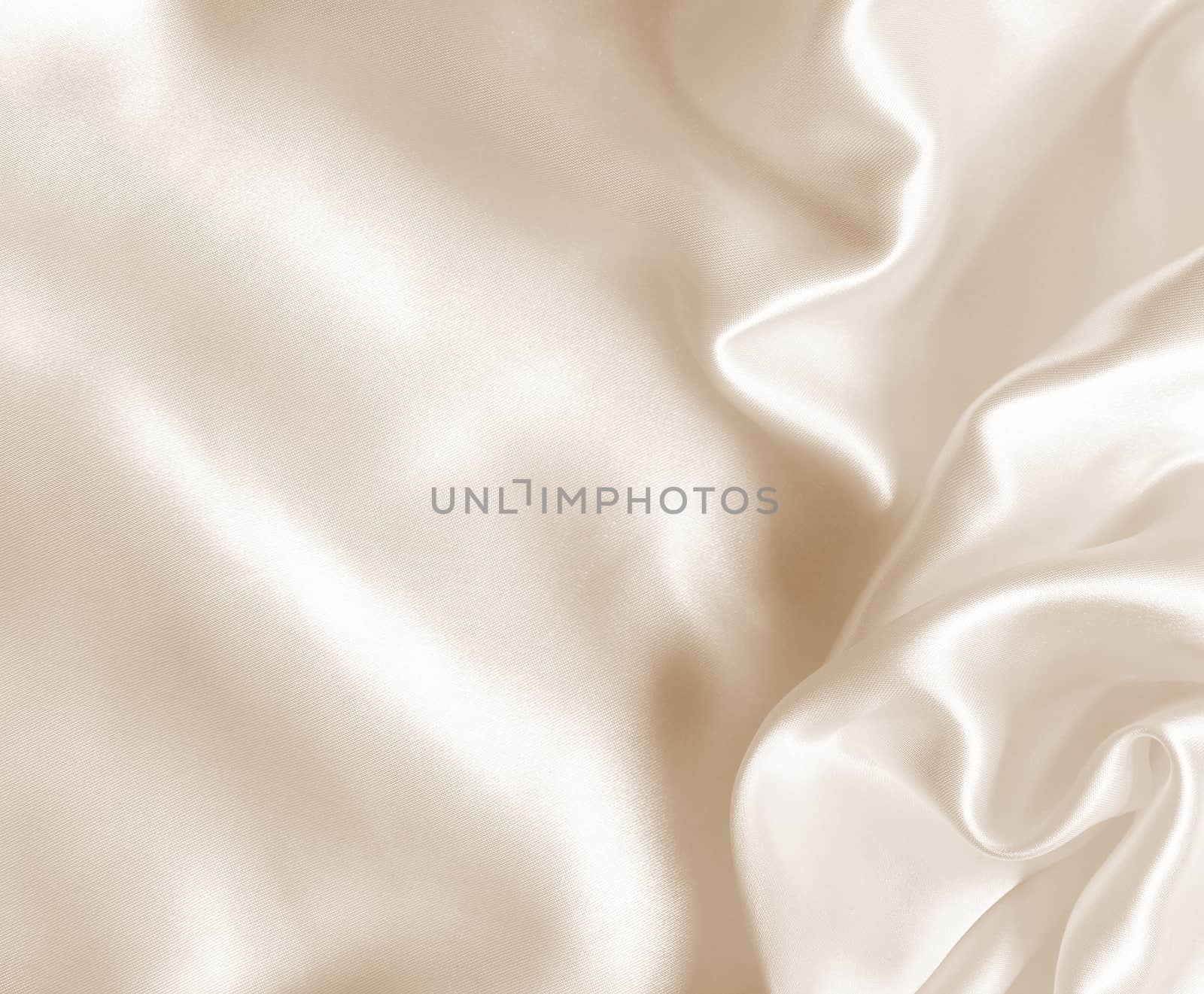 Smooth elegant golden silk as wedding background. In Sepia toned by oxanatravel