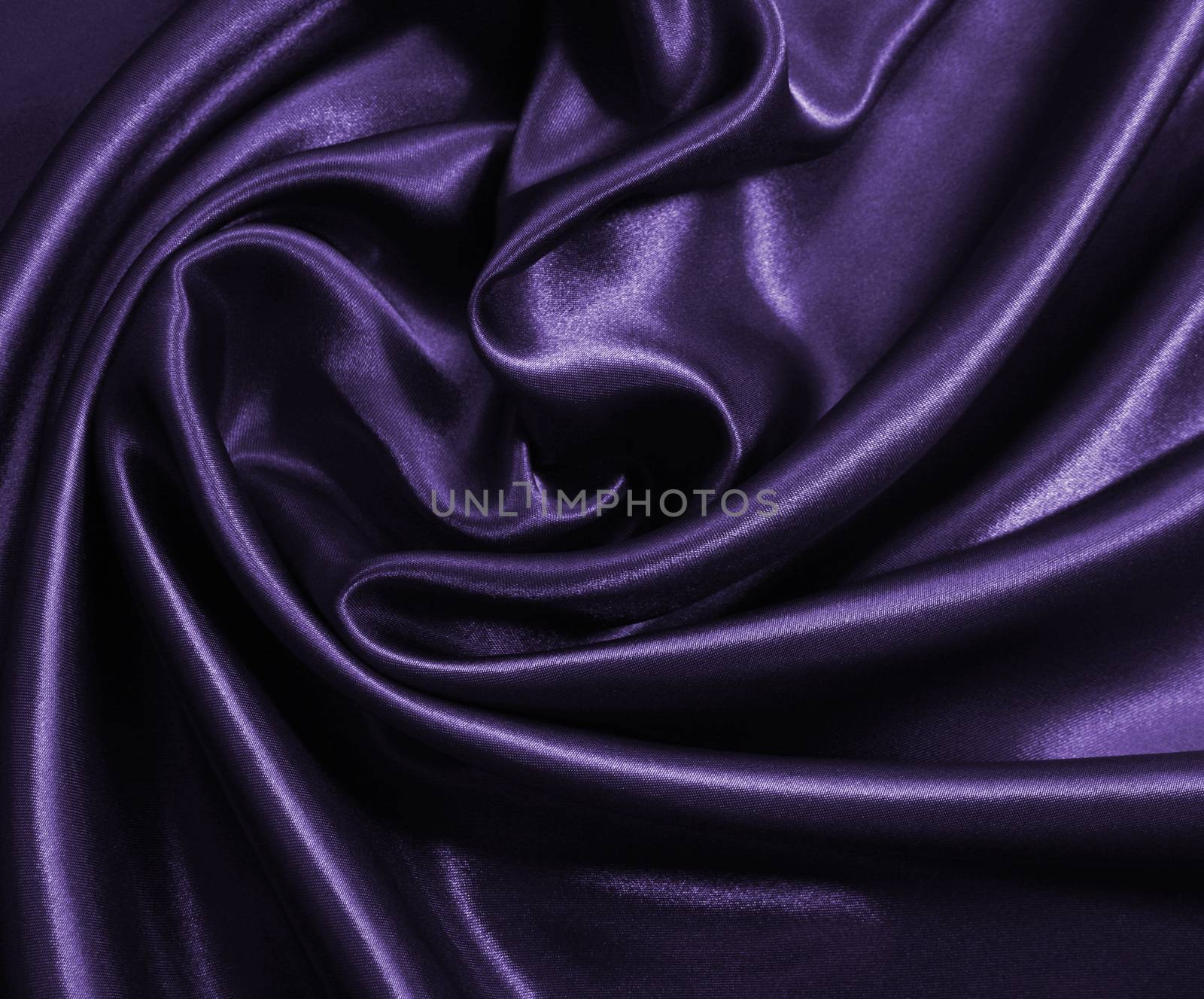 Smooth elegant lilac silk or satin as background 