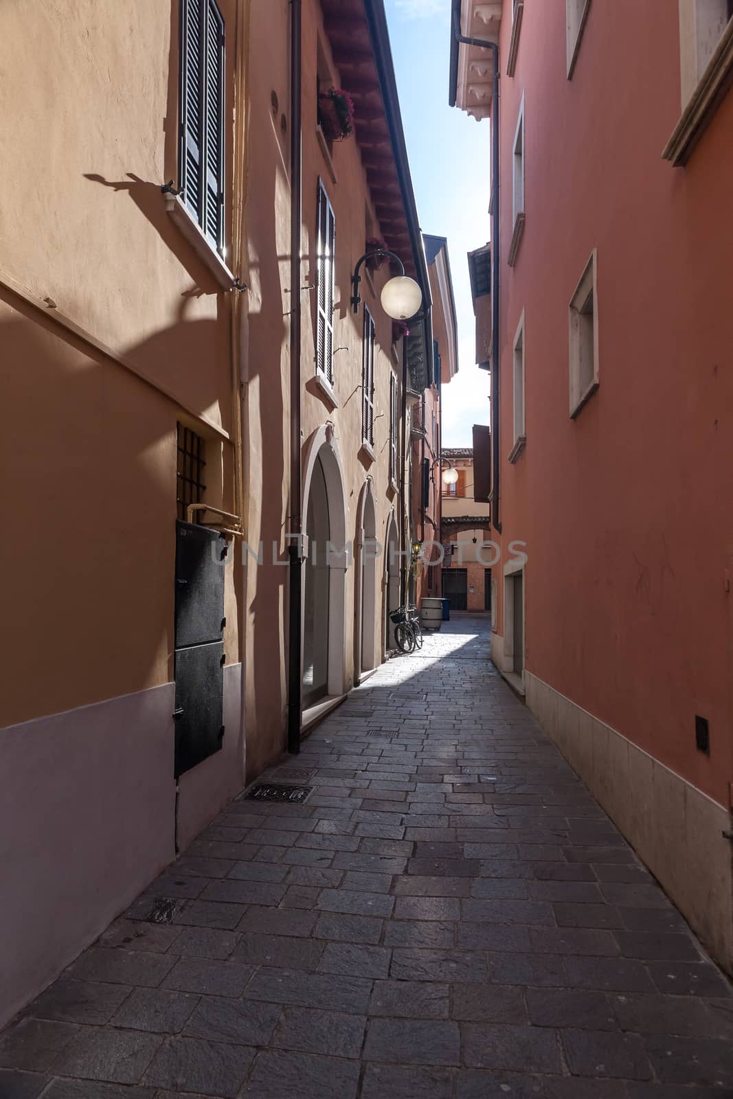 Classic narrow street of the old city in Italy