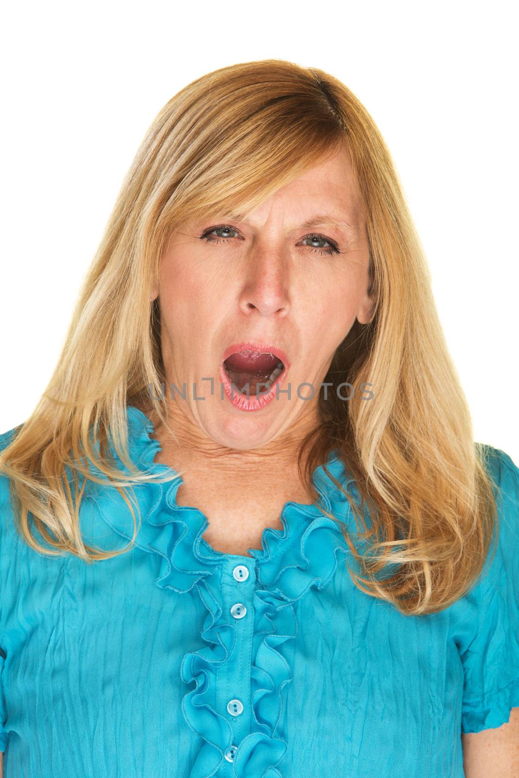 Yawning adult female in blue over isolated background