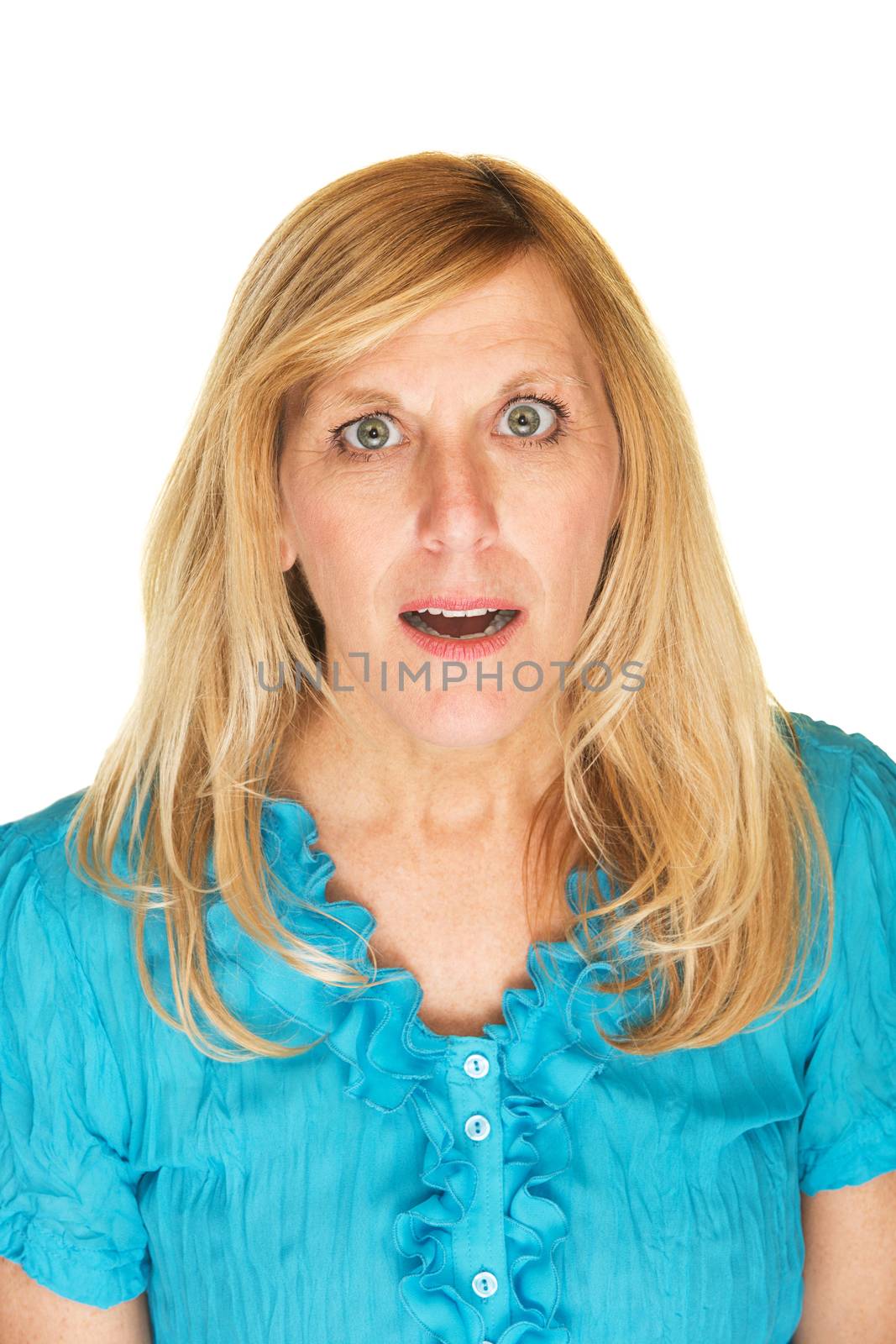 Intrigued middle aged Caucasian female in blue