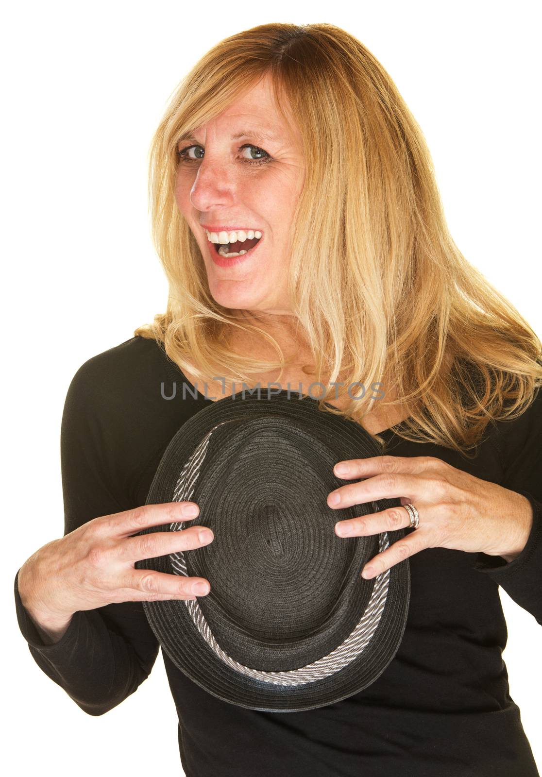 Beautiful middle aged singer holding black hat