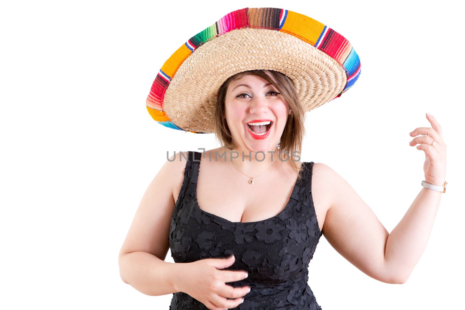 Close up Happy Portrait of a Dancing Lady in Casual Black Shirt with Mexican Sombrero, Looking at the Camera on a White Background.
