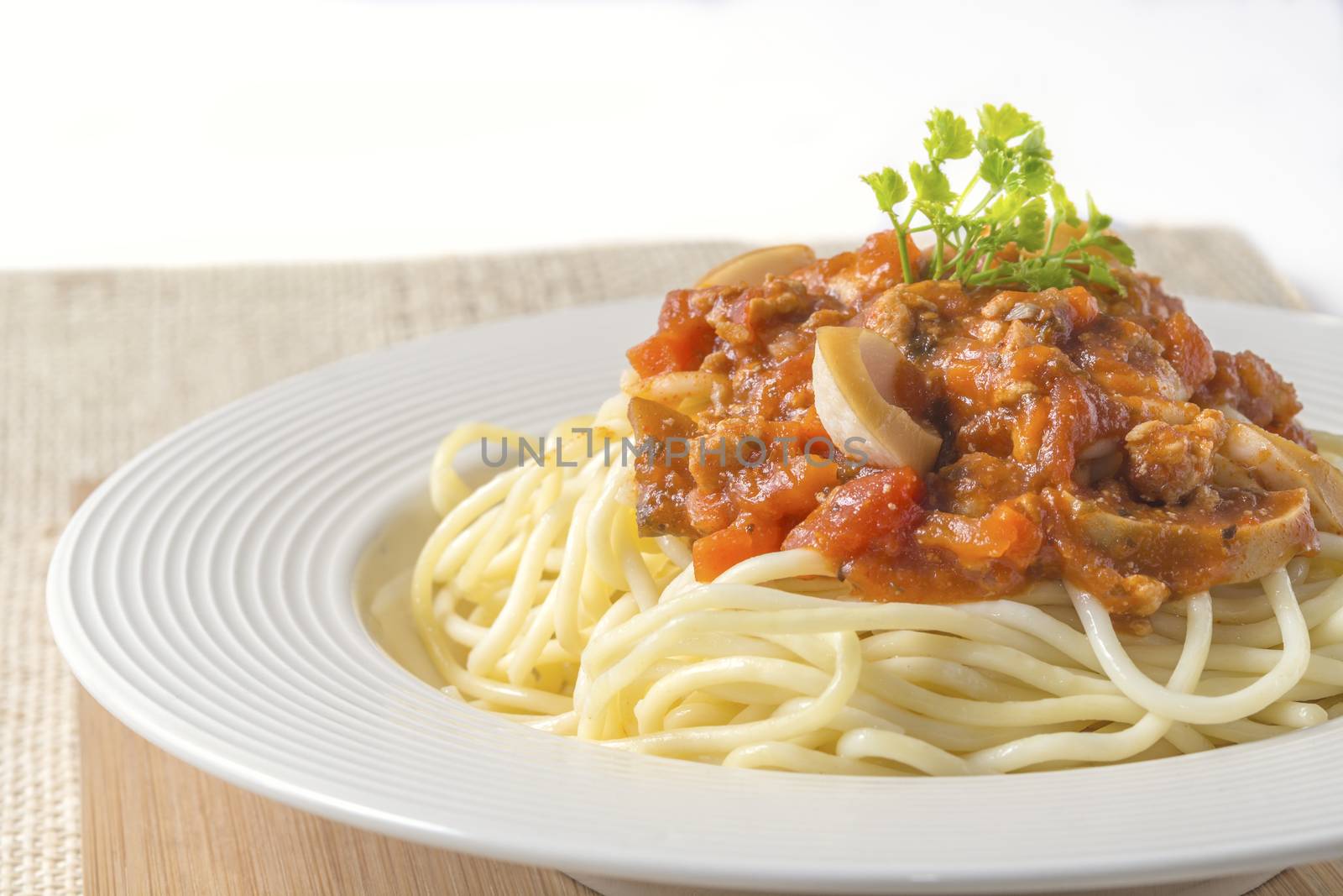 Spaghetti pasta with tomato beef sauce on dish
