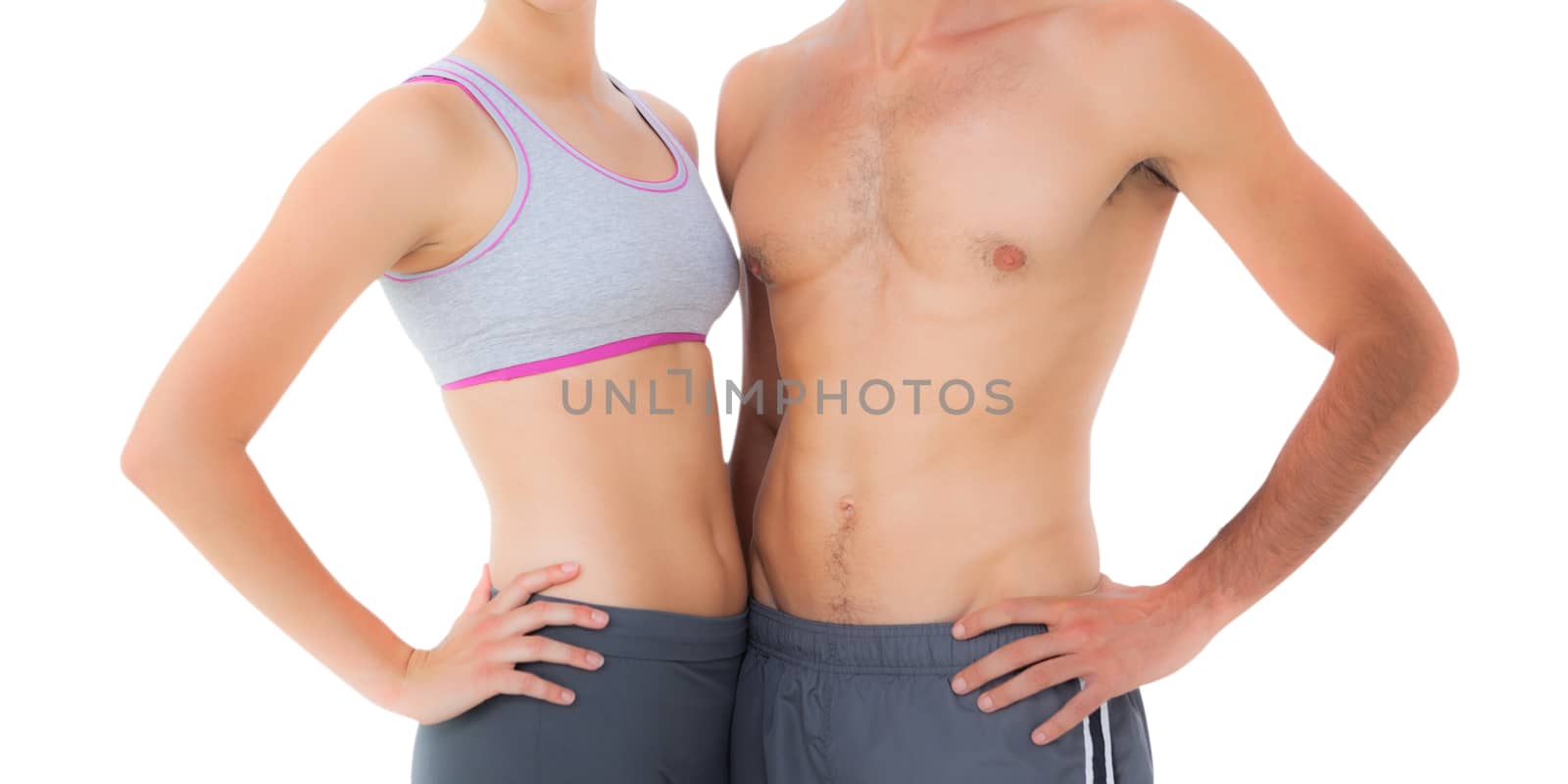 Mid section of a fit young couple by Wavebreakmedia