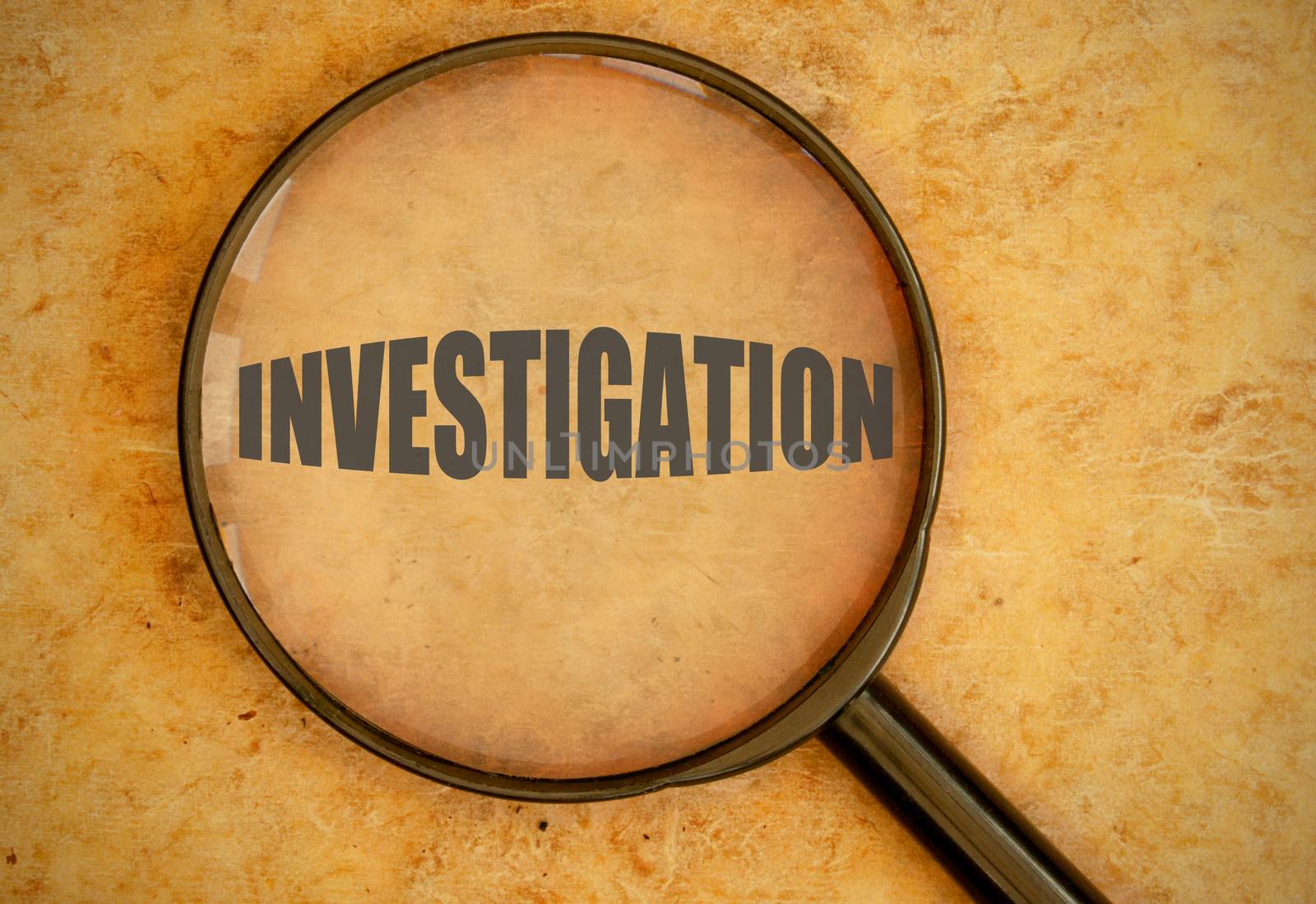 Magnifying glass focused on investigation