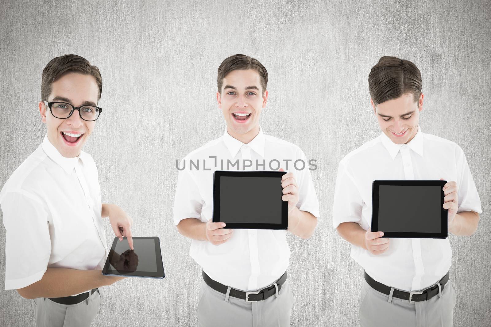 Nerd with tablet pc against white and grey background