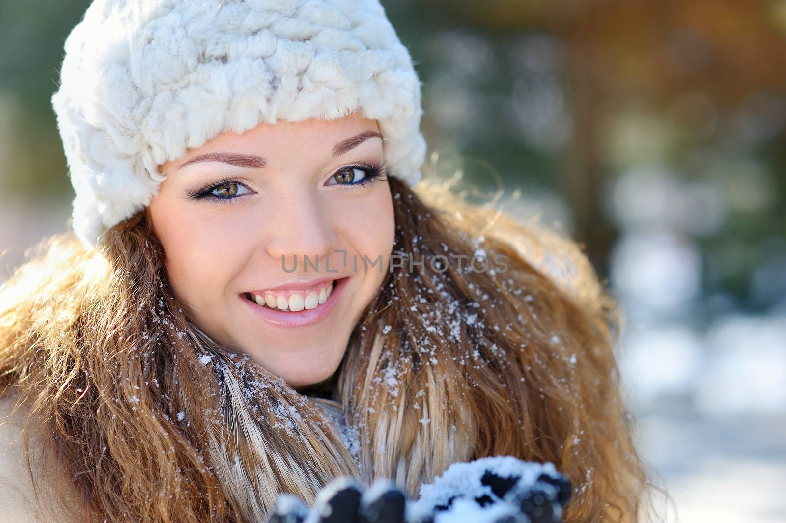 portrait of a beautiful girl on the street in winter.