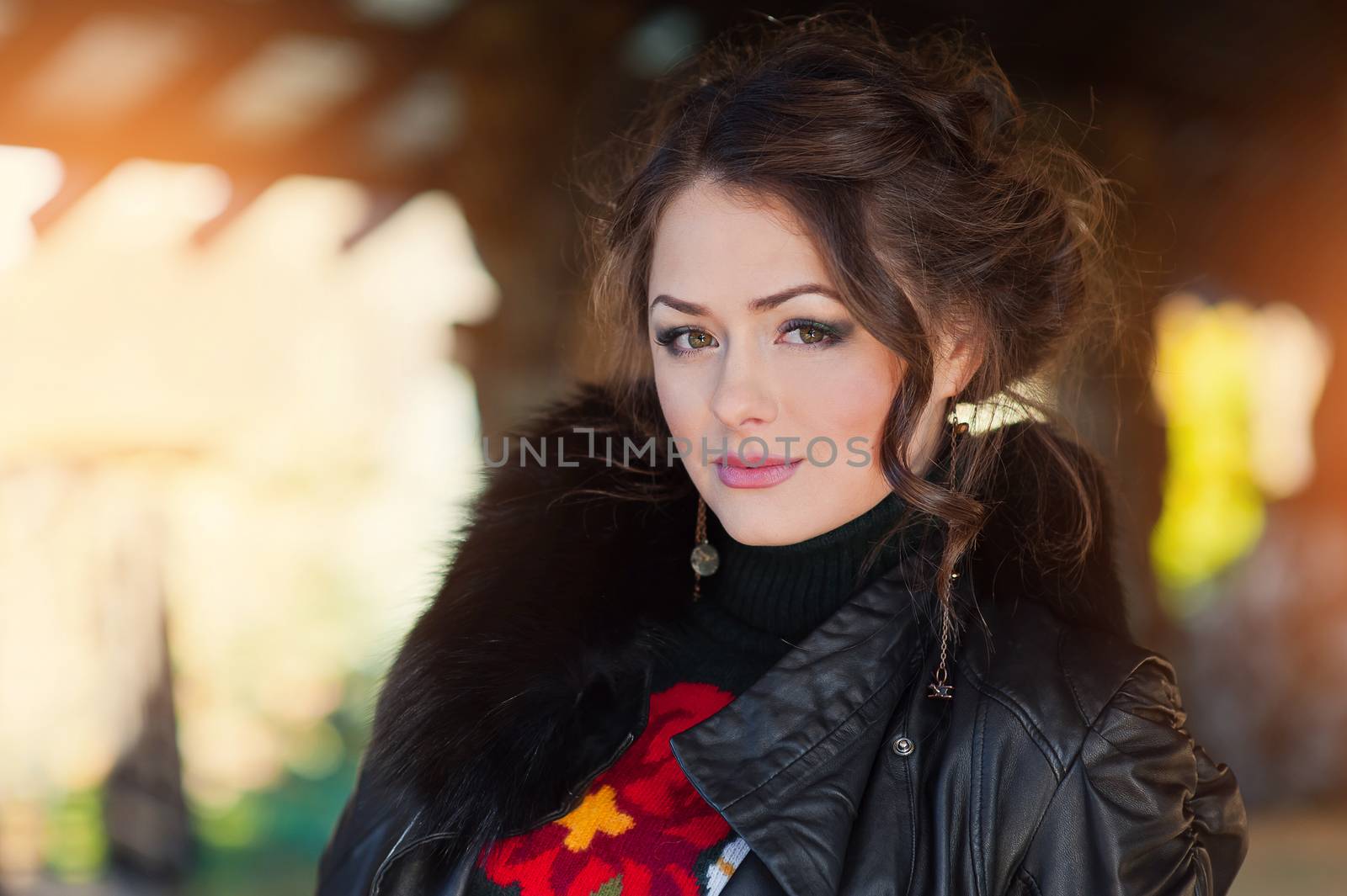 Portrait of a beautiful sexy brunette on natural background.