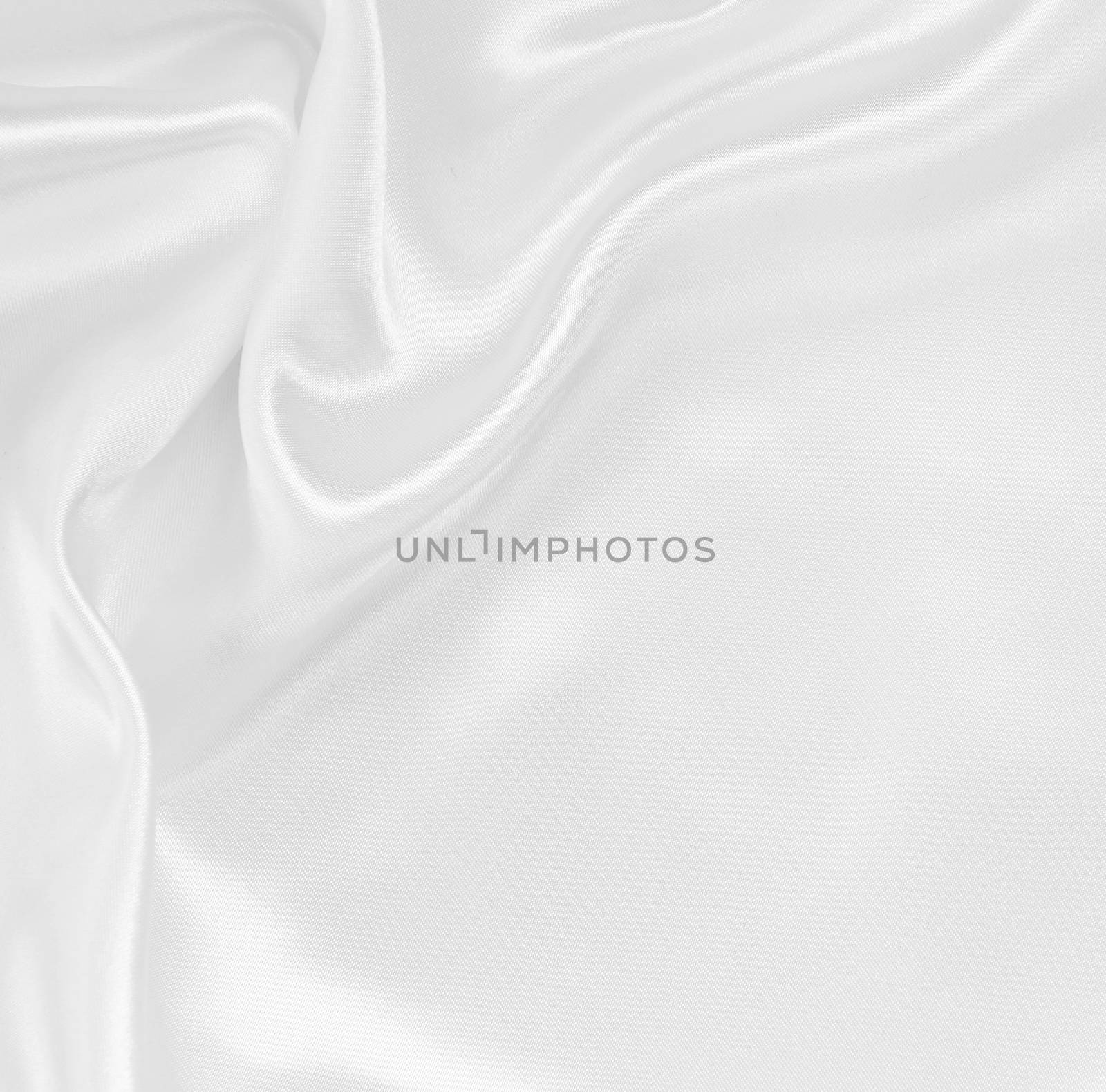 Smooth elegant white silk or satin texture can use as wedding background
