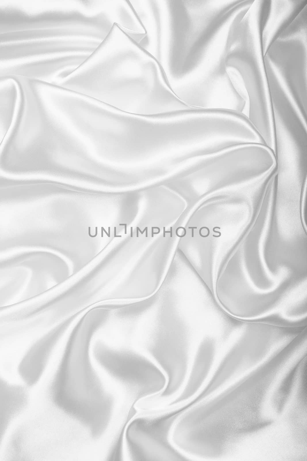 Smooth elegant white silk or satin as wedding background by oxanatravel