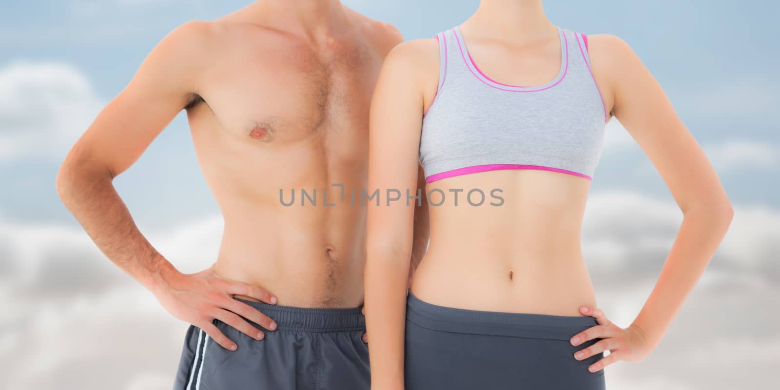 Composite image of mid section of a fit young couple by Wavebreakmedia