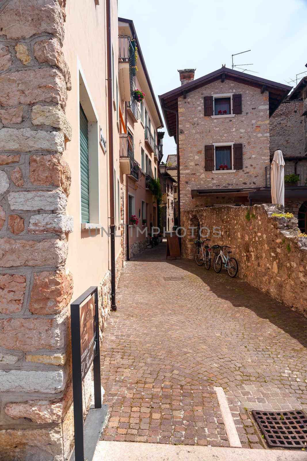 Classic narrow street of the old city in Italy