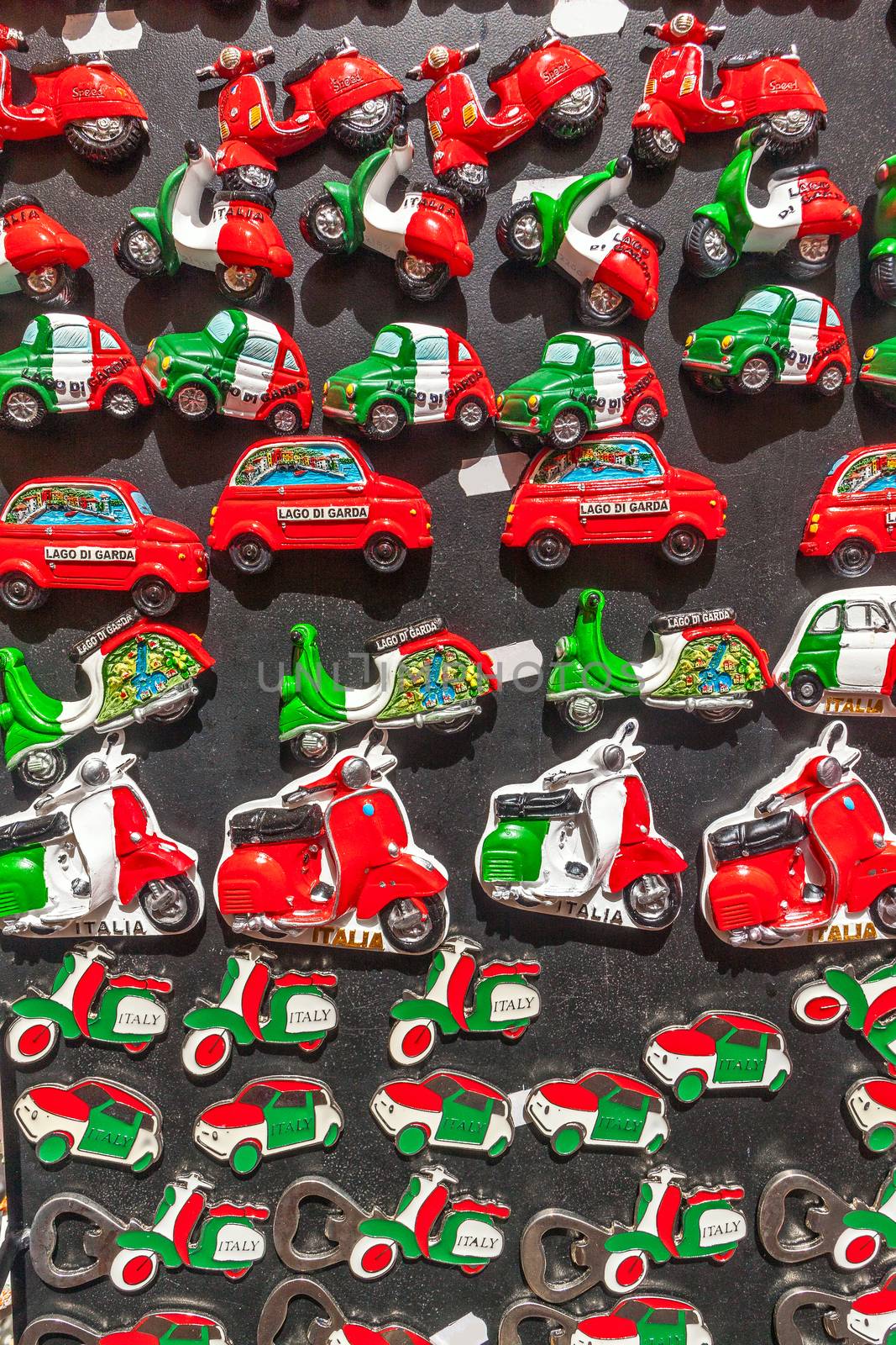 Collection of souvenir magnets of Italy in Italian flag colors