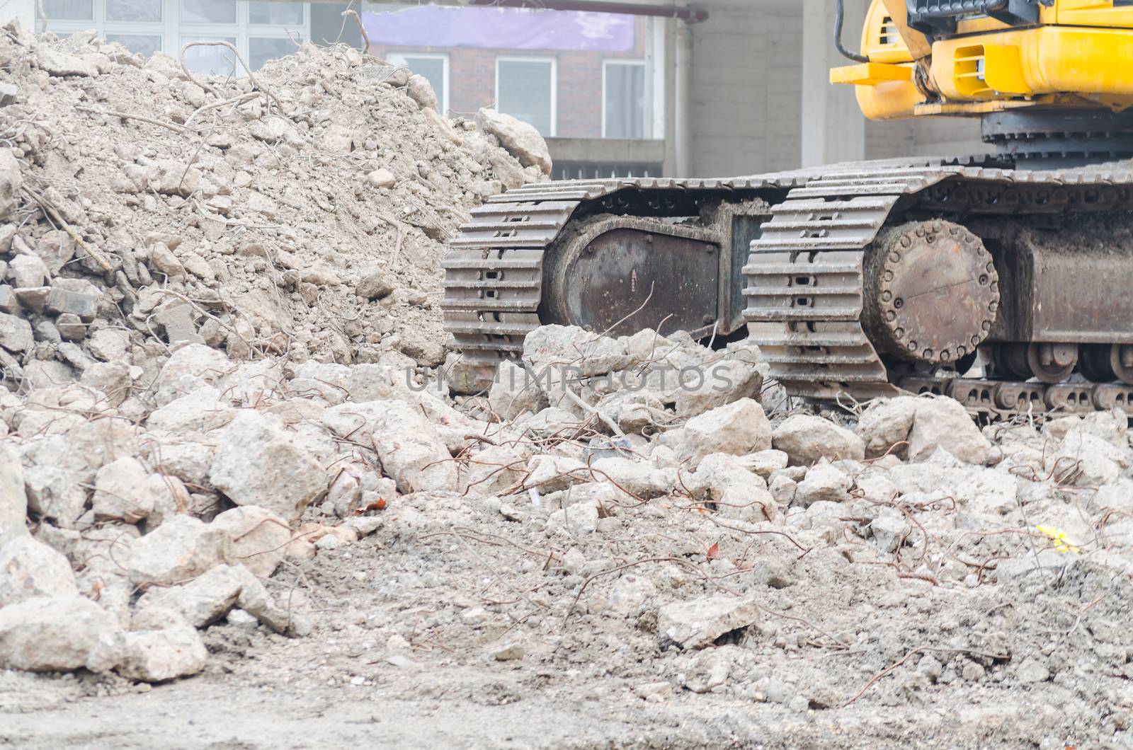 Closeup on the chassis of a tracked vehicle.