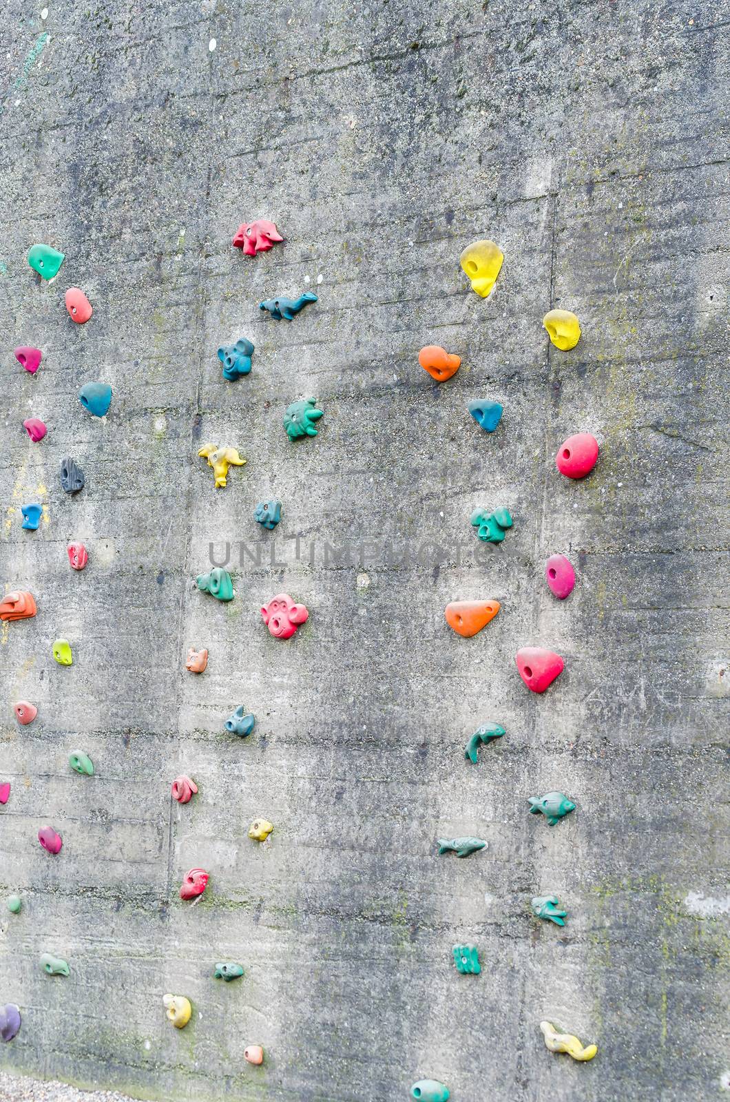Detail climbing wall at an amusement park.