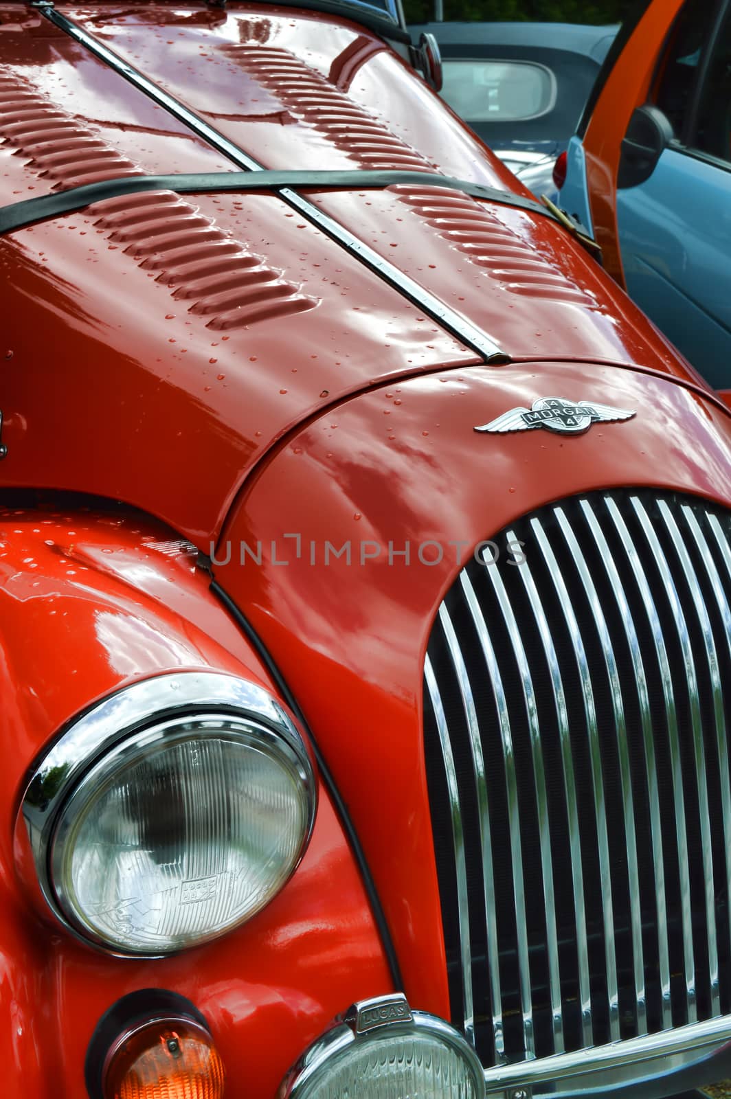 a red morgan 4/4 classic car